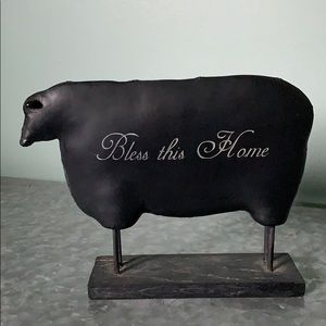 Farmhouse cow on wooden stand